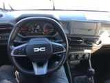 a picture of a car dashboard with a steering wheel