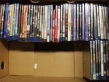 a box full of dvds sitting on top of a table