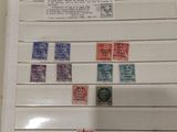 a picture of a display of stamps on the wall