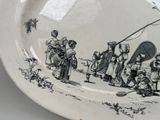 a black and white plate with a drawing of people on it