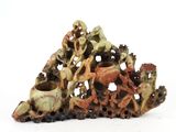 a sculpture of a pile of animals on top of a pile of rocks