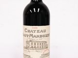 a bottle of wine that is sitting on a table