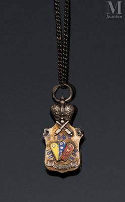 a close up of a necklace on a black surface with a black background