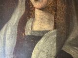 an old painting of a woman with a veil on her head