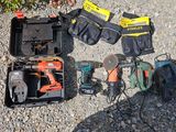 many tools that are laying out on the ground