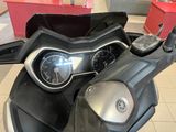 a close up of a motorcycle with a speedometer on it