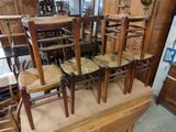 a lot of chairs that are stacked on top of each other