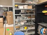 a room filled with lots of tools and a blue chair