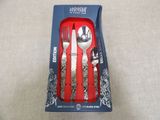 three forks and spoons in a box on a table