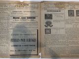 an old newspaper with a bunch of stamps on it