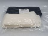 two pieces of white and black cloth wrapped in plastic