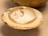 a small bowl and a small bowl on a table