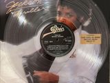 a close up of a vinyl record with a picture of michael jackson on it