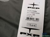 a tag that says rxp on it on a bed