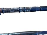 two pens that are sitting side by side on a white surface