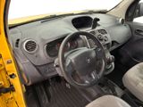 dashboard of a small yellow car with a steering wheel and dashboard controls