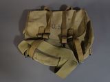 un sac beige muni de deux anses sur le dessus