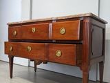 a wooden dresser with two drawers and a marble top