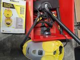 a red box with a vacuum and a yellow box with a black handle