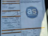 a picture of a car ' s driver ' s license and a receipt