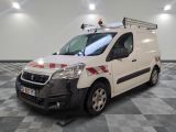 the white van is parked in a large room with a checkered floor