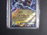 a close up of a pokemon card in a plastic case