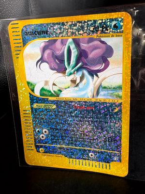 a close up of a pokemon card on a table