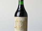 a bottle of wine that is sitting on a table