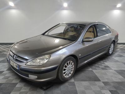 a picture of a car that is parked in a garage