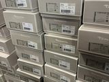 boxes stacked on top of each other in a warehouse