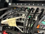 a bunch of wires in the center of a car