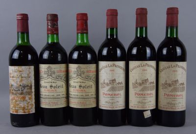 six bouteilles de vin sont alignées dans une rangée