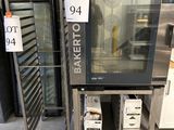 deux fours placés l'un à côté de l'autre dans une pièce