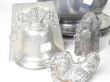 a lot of silver items that are on a table