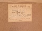 an old picture of a business card on a piece of paper