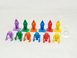 a lot of toy figures that are on a white surface
