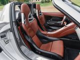 the interior of a sports car with leather seats and leather trims