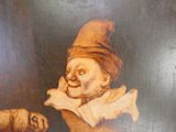 une photo d'un tableau représentant un clown et un mouton