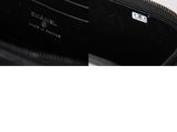 the inside of a black purse with a zipper on it