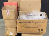 many boxes stacked on top of each other on a dolly