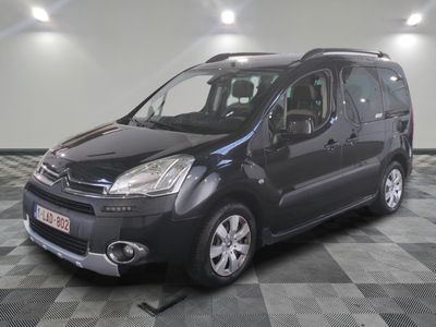 the black citrole van is parked in a large room