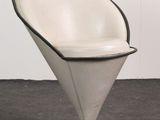 an image of a white chair with a black seat