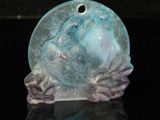 a picture of a blue and purple glass object