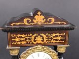 a clock that is sitting on top of a table