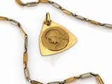 gold plated necklace with a coin and a triangle pendant on a chain