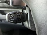 a close up of a steering control in a car