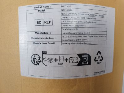 un autocollant apposé sur le côté d'un réfrigérateur et comportant des instructions