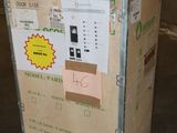 a cardboard box with a sticker on it sitting on a pallet