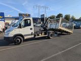 a white truck that is parked in a parking lot