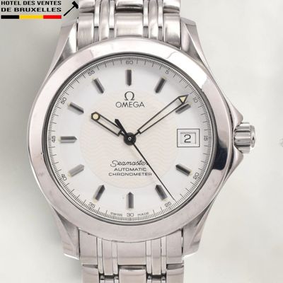 an image of a close up of a wrist watch with a white dial